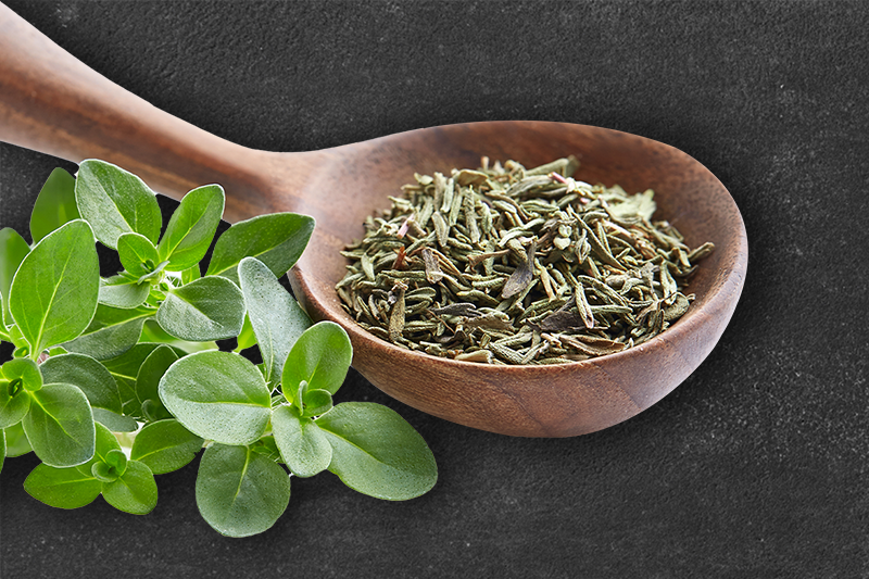 A spoon of dried thyme powder.